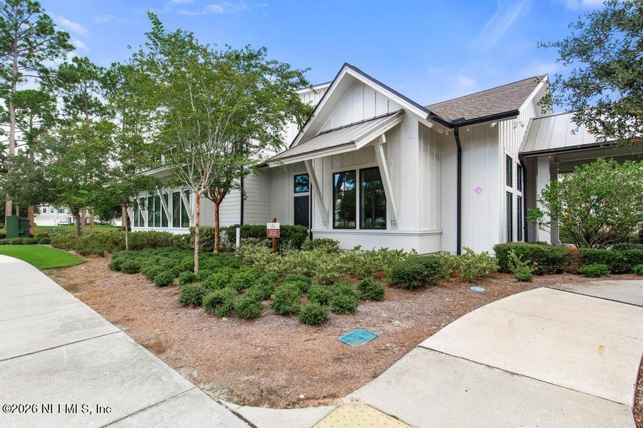 Front exterior of a new home in Trailmark, St. Augustine, FL, highlighting curb appeal (Image 24). Front exterior of a new home in Trailmark, St. Augustine, FL, highlighting curb appeal (Image 24).