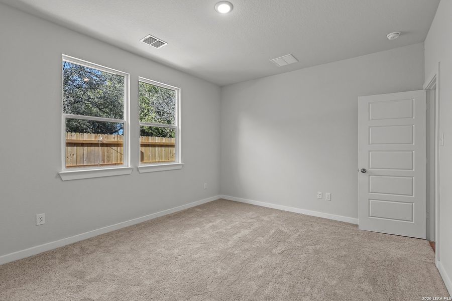 Spacious, unfurnished interior of a new home in Senna, Leon Valley (Image 13).