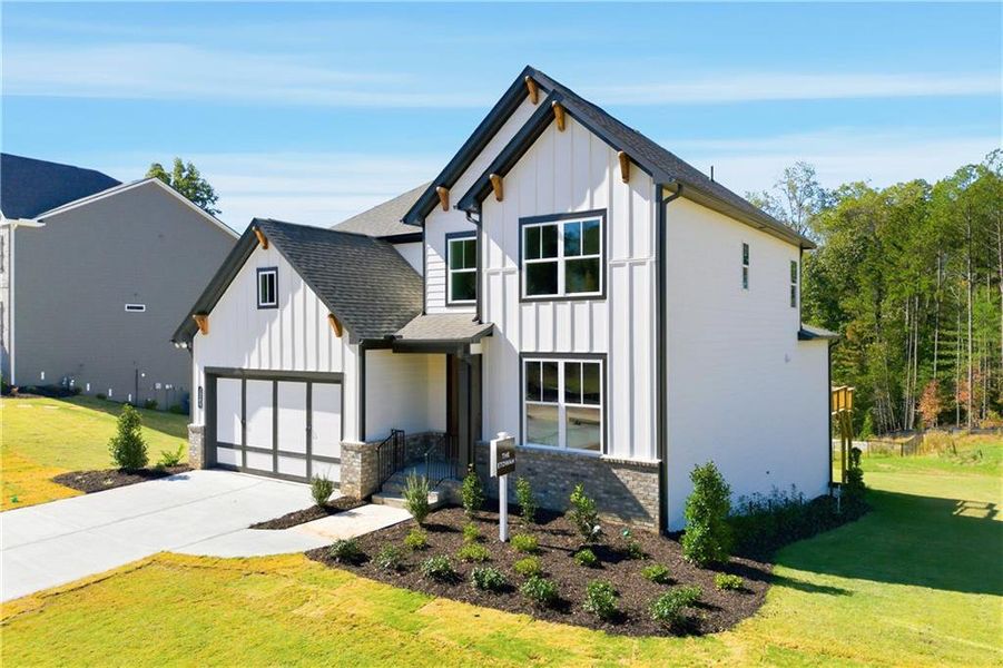 Front exterior of a new home in Sterlington, Canton, GA, highlighting curb appeal (Image 1). Front exterior of a new home in Sterlington, Canton, GA, highlighting curb appeal (Image 1).