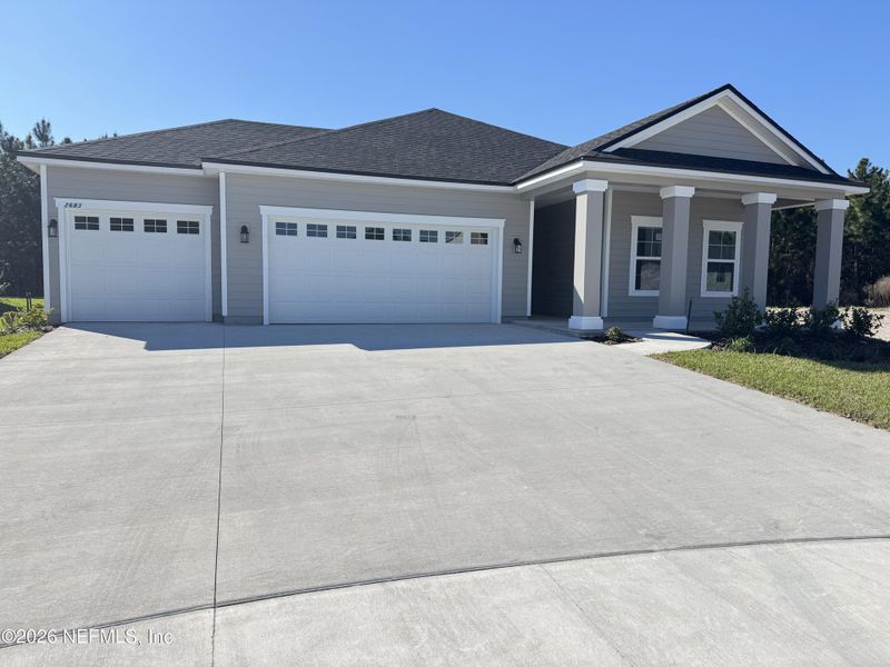 Front exterior of a new home in Hyland Trail, Green Cove Springs, FL, highlighting curb appeal (Image 19).