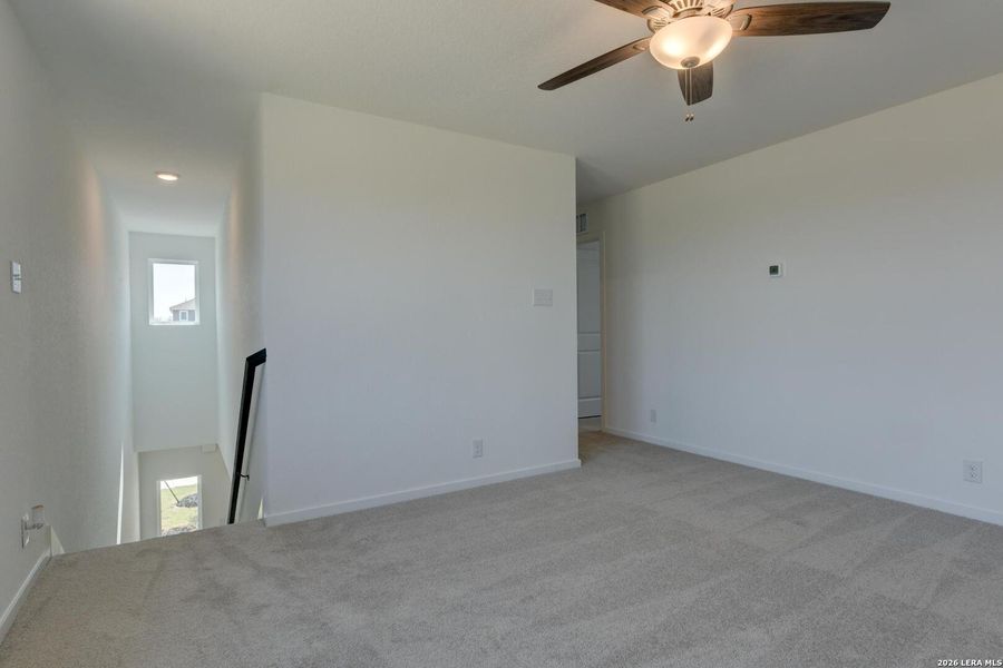 Spacious, unfurnished interior of a new home in Hennersby Hollow, San Antonio (Image 28).
