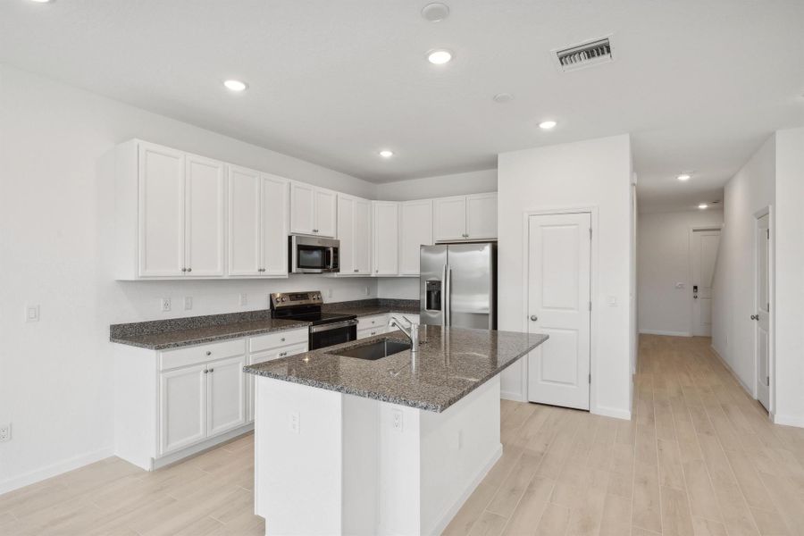 Furnished interior view inside a new home in , Stuart (Image 7).