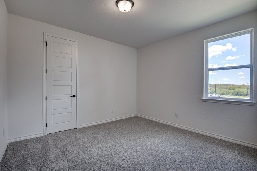 Representative unfurnished interior of a home built from the The Lanier F by Davidson Homes LLC in The Reserve at Potranco Oaks, Castroville (Image 25).