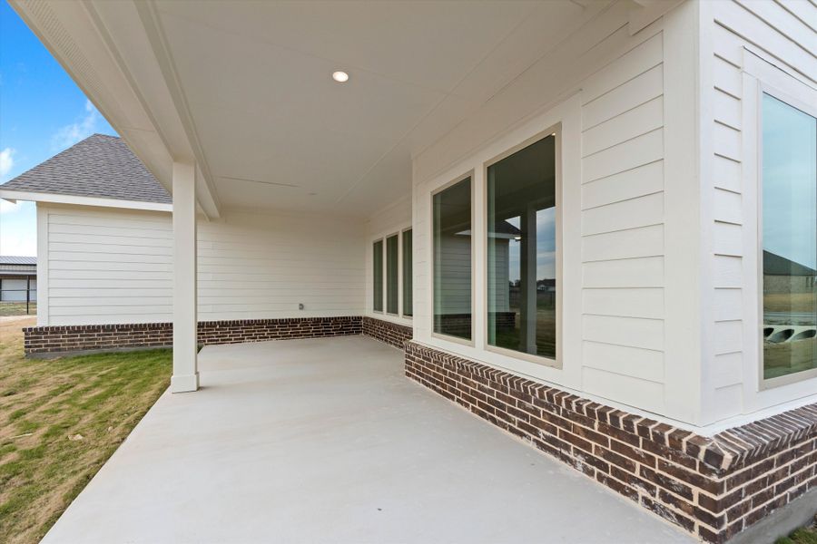Exterior details and patio area of a home in Fairview Meadows, New Fairview (Image 4). Exterior details and patio area of a home in Fairview Meadows, New Fairview (Image 4).