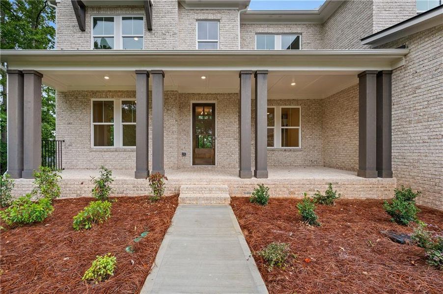 Front exterior of a new home in , Cumming, GA, highlighting curb appeal (Image 23).