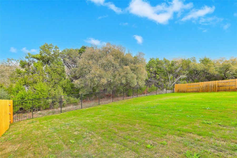 Green space behind the home.