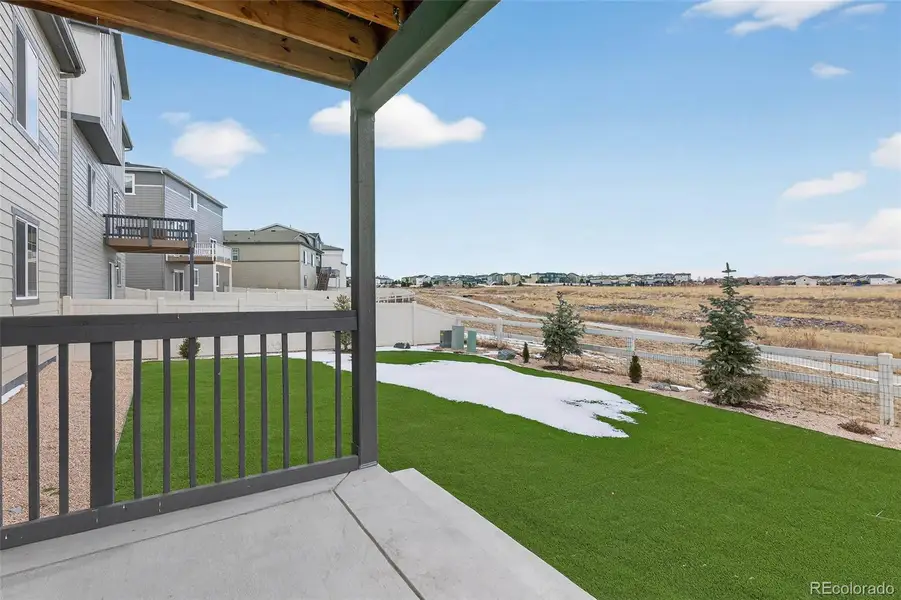 Exterior details and patio area of a home in Anthology North, Parker (Image 23).