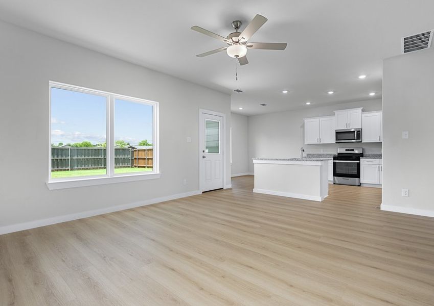 Open floor plan provides an easy entertaining space and lots of natural light. Open floor plan provides an easy entertaining space and lots of natural light.