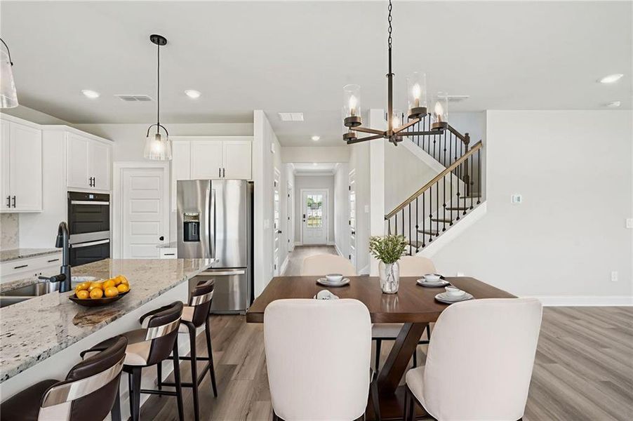 Furnished interior view inside a new home in Martin Springs - Estate Series, Lawrenceville (Image 7).