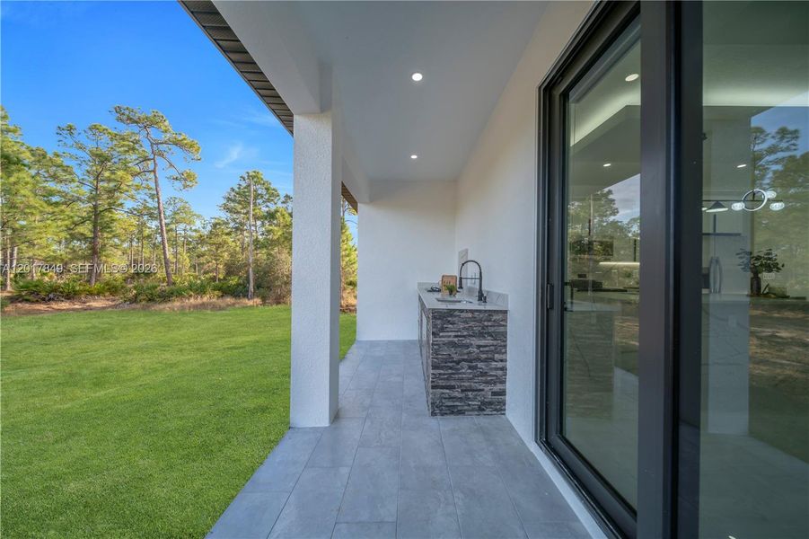Exterior details and patio area of a home in , Lehigh Acres (Image 28).