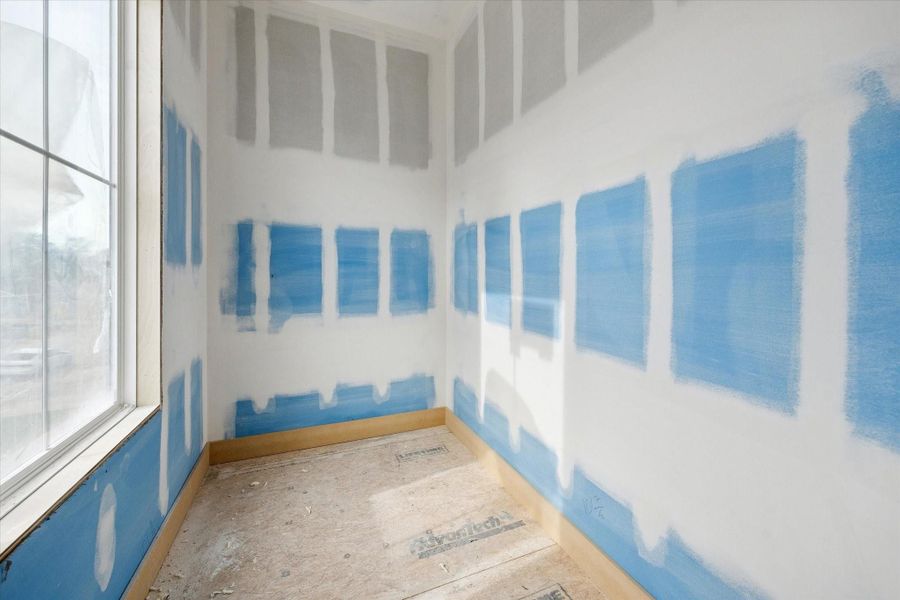 A dedicated closet offers practical storage while maintaining a clean, uncluttered feel.