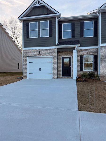 Front exterior of a new home in Carolina, Palmetto, GA, highlighting curb appeal (Image 20). Front exterior of a new home in Carolina, Palmetto, GA, highlighting curb appeal (Image 20).