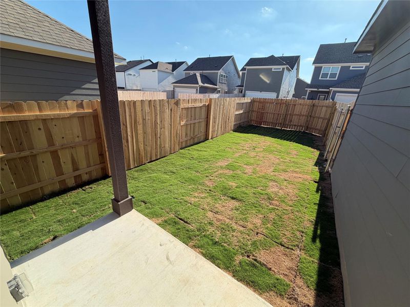 Exterior details and patio area of a home in Lariat, Liberty Hill (Image 4).