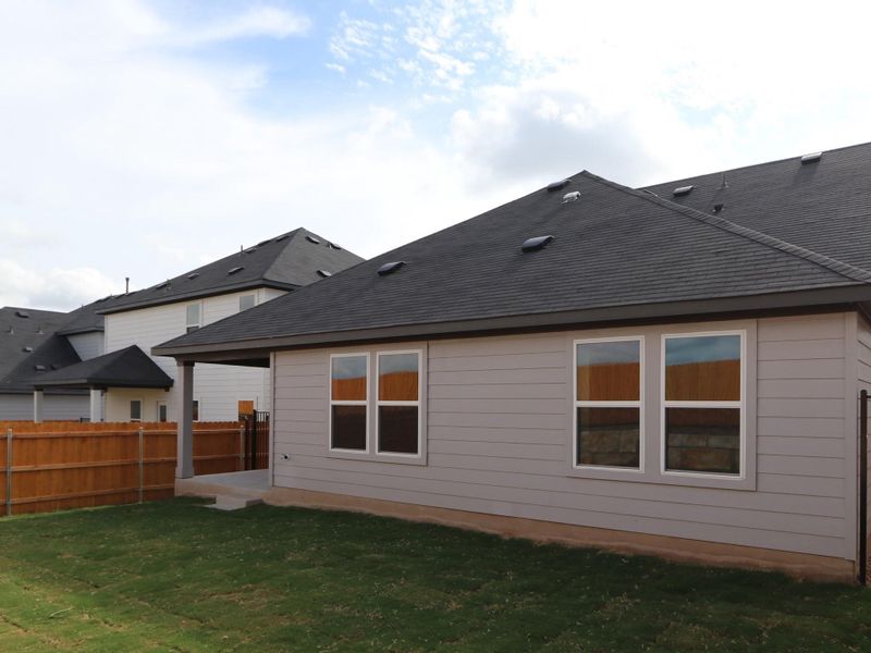 Exterior details and patio area of a home in Cascades at Onion Creek, Austin (Image 3).