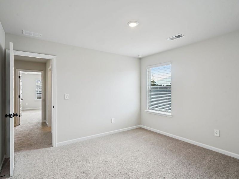 The Taylorsville floorplan with the Divine White interior package.