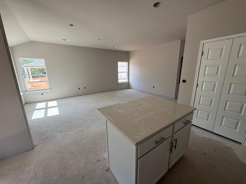 Unfurnished room with concrete flooring