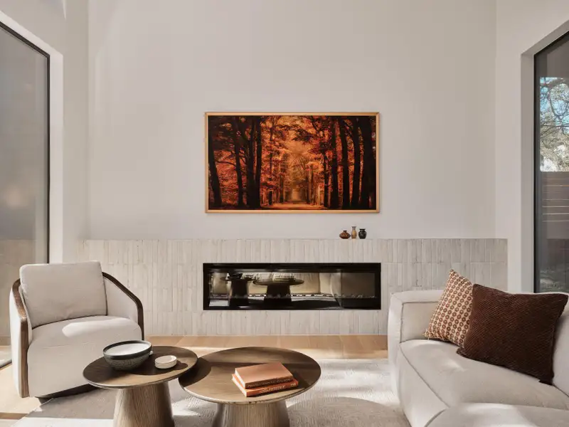 Sitting room with a brick fireplace