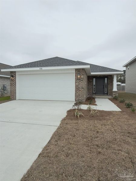 Front exterior of a new home in Allison Acres, Cantonment, FL, highlighting curb appeal (Image 1). Front exterior of a new home in Allison Acres, Cantonment, FL, highlighting curb appeal (Image 1).