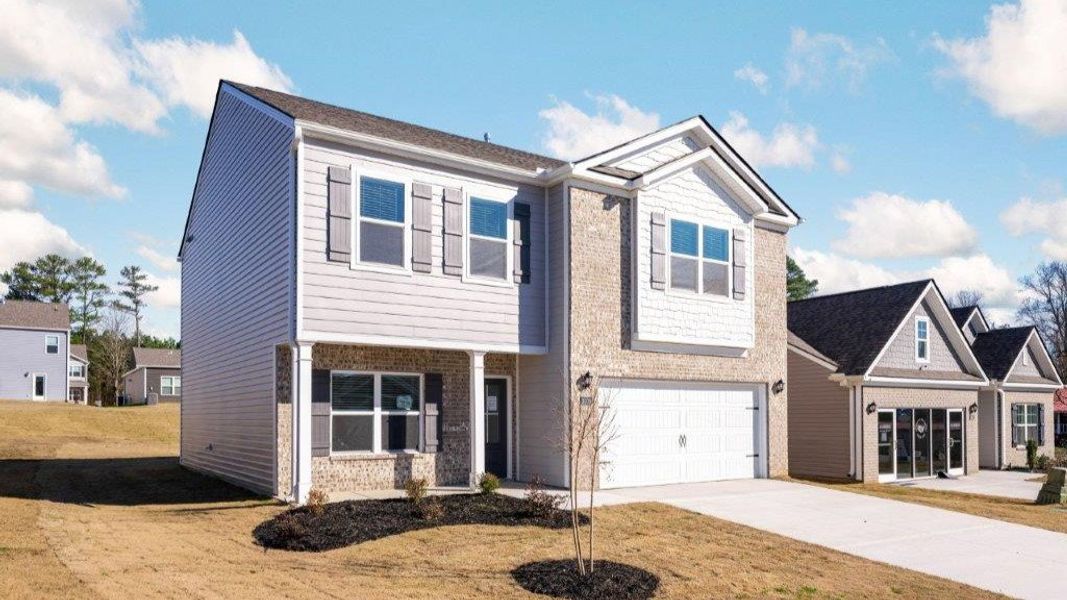 Front exterior of a new home in Hillcrest Landing, McDonald, TN, highlighting curb appeal (Image 2).
