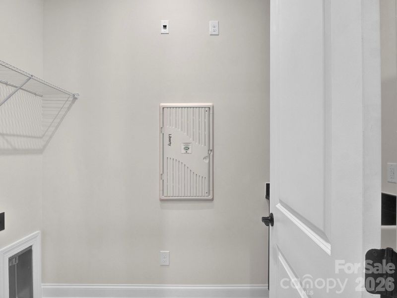Laundry Room with Base Cabinet & Sink.