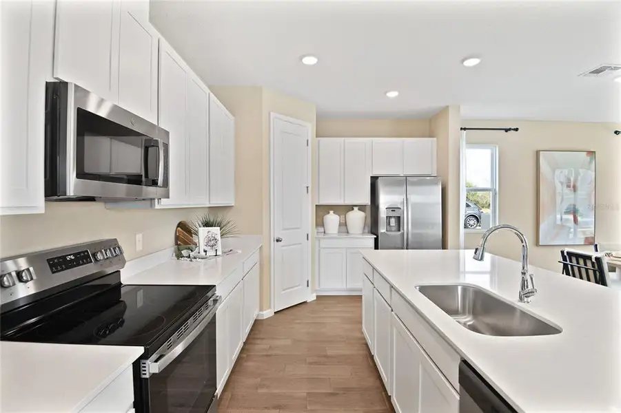 Furnished interior view inside a new home in Maple Ridge, Palmetto (Image 5). Furnished interior view inside a new home in Maple Ridge, Palmetto (Image 5).