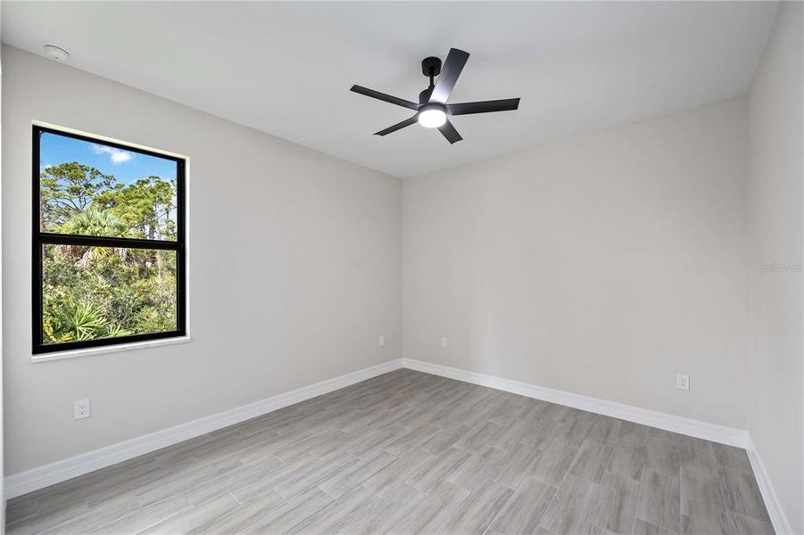 Spacious, unfurnished interior of a new home in , Port Charlotte (Image 18).