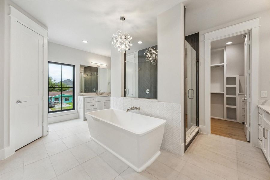 Primary suite includes separate vanities, his and her closets, and a "car-wash" shower! Primary suite includes separate vanities, his and her closets, and a "car-wash" shower!