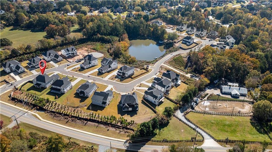 Front exterior of a new home in The Retreat at Caney Creek, Alpharetta, GA, highlighting curb appeal (Image 29).