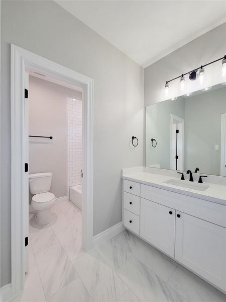 Furnished interior view inside a new home in , Conroe (Image 32).