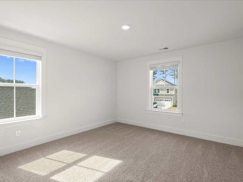 Spacious, unfurnished interior of a new home in The Coves at Lakes of Cane Bay, Summerville (Image 29). Spacious, unfurnished interior of a new home in The Coves at Lakes of Cane Bay, Summerville (Image 29).