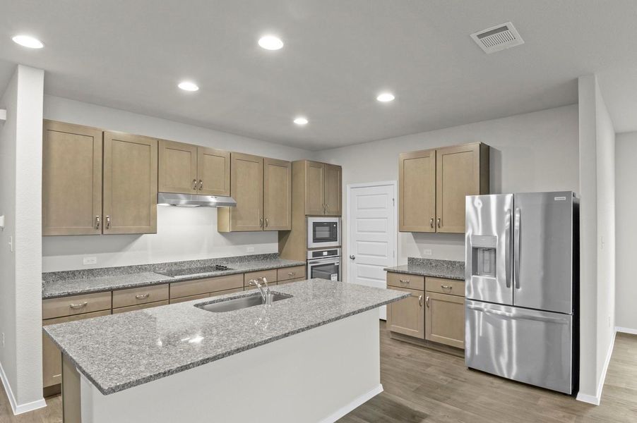 Furnished interior view inside a new home in Oaks at San Gabriel, Georgetown (Image 9).