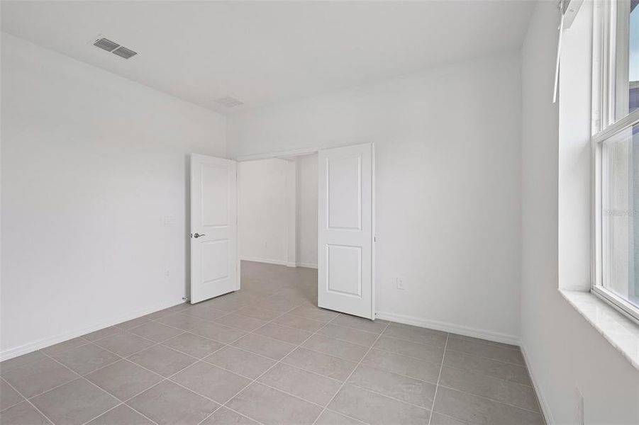 Spacious, unfurnished interior of a new home in Southpointe, Palmetto (Image 11). Spacious, unfurnished interior of a new home in Southpointe, Palmetto (Image 11).