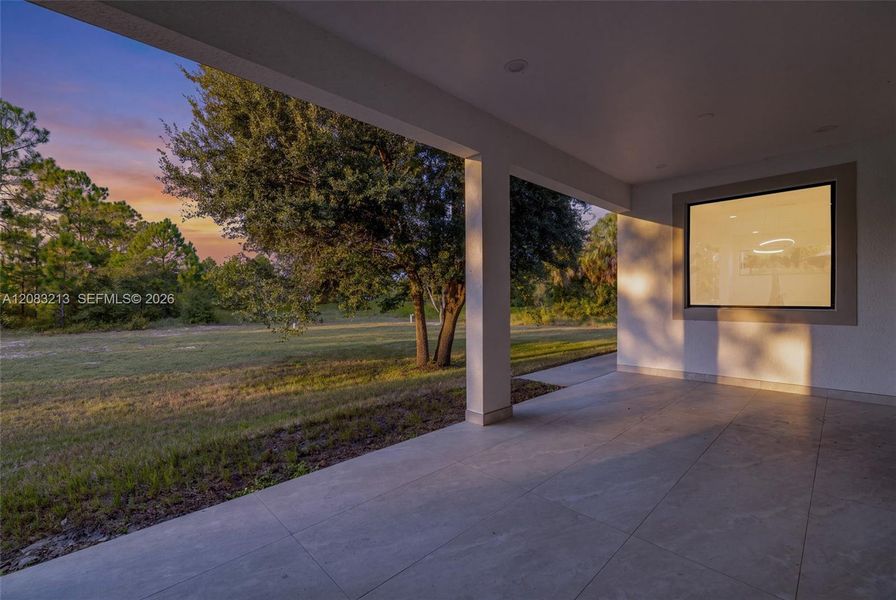 Exterior details and patio area of a home in , Lehigh Acres (Image 4).