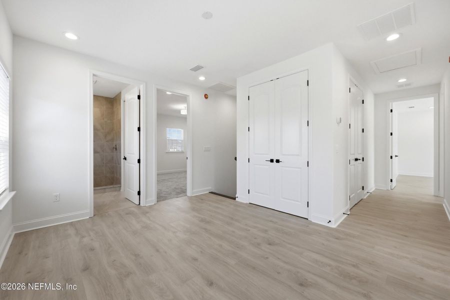 Spacious, unfurnished interior of a new home in Silver Landing At Silverleaf, St. Augustine (Image 40).