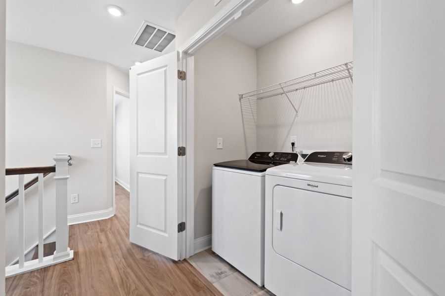 Furnished interior view inside a new home in Lakeside Townes at Riverlights, Wilmington (Image 7).
