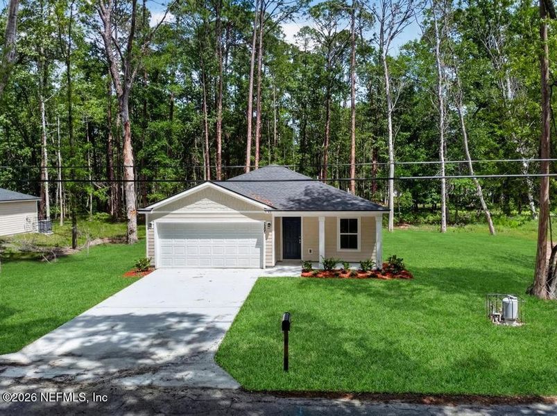 Front exterior of a new home in , Jacksonville, FL, highlighting curb appeal (Image 28).