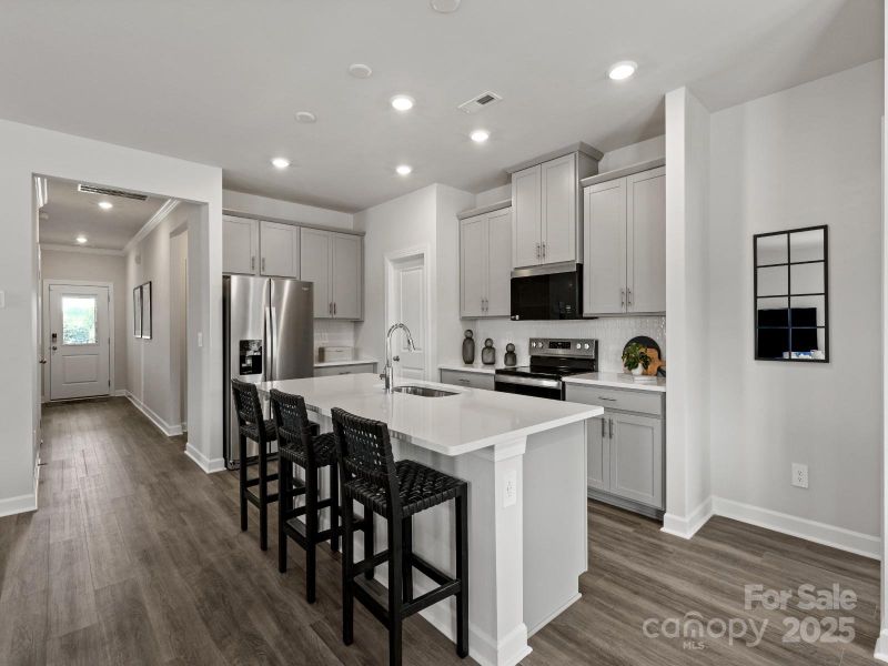 Photo is not of the actual home, but is an inspirational photo of builder’s model home and may depict options, furnishings, and/or decorator features that are not included