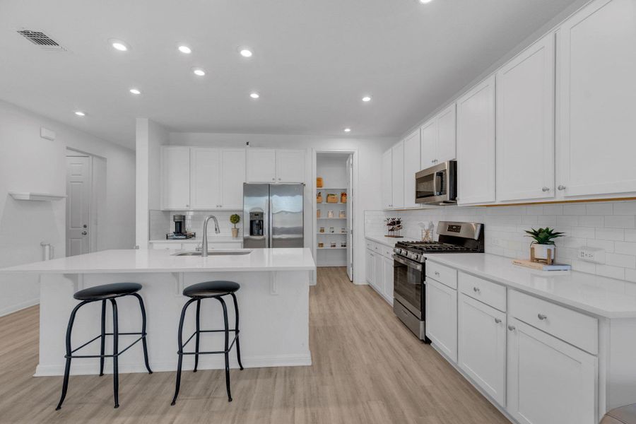 Furnished interior view inside a new home in Seasons at Carillon, Manor (Image 12).