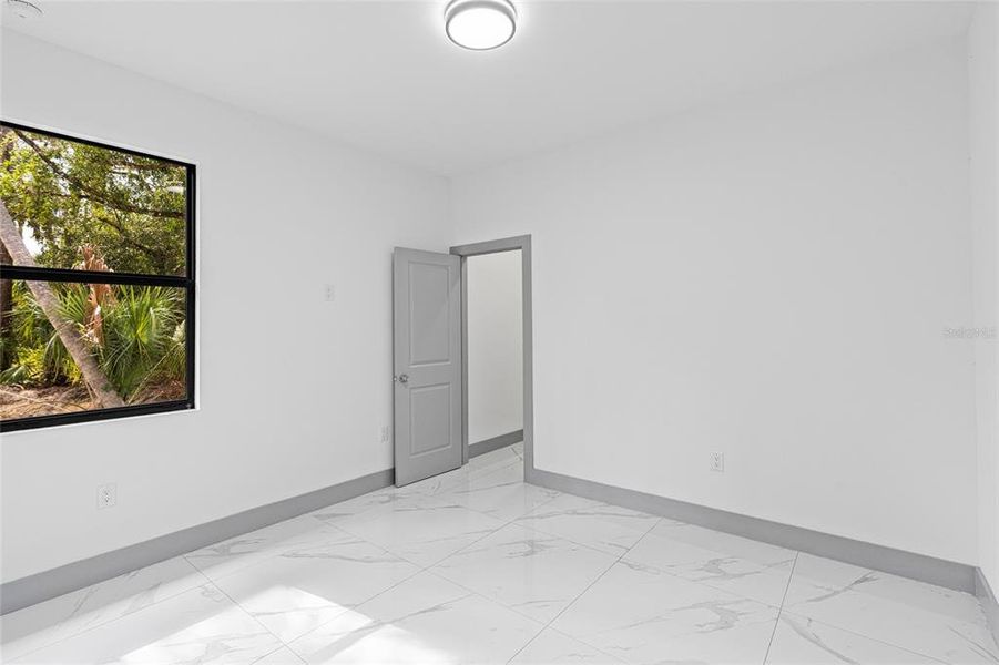 Spacious, unfurnished interior of a new home in , Port Charlotte (Image 29).