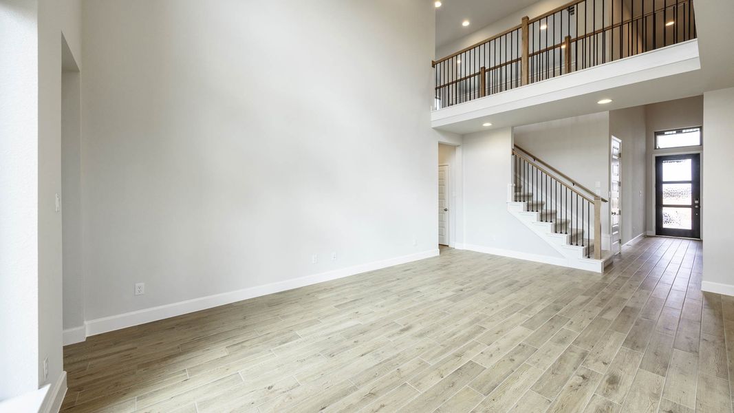 Spacious, unfurnished interior of a new home in The Colony, Bastrop (Image 5).
