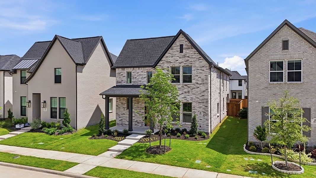 Front exterior of a new home in Light Farms Brenham - 40' Lots, Celina, TX, highlighting curb appeal (Image 2). Front exterior of a new home in Light Farms Brenham - 40' Lots, Celina, TX, highlighting curb appeal (Image 2).