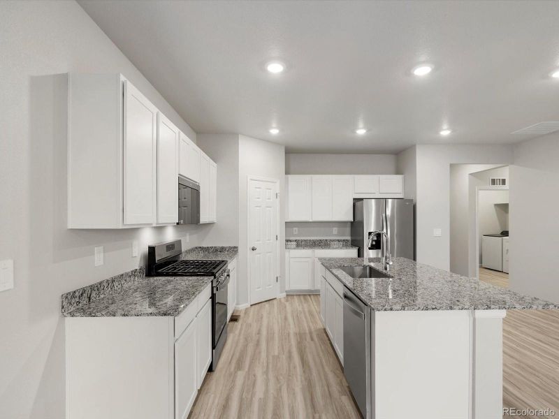 Furnished interior view inside a new home in Buffalo Highlands: The Canyon Collection, Commerce City (Image 8). Furnished interior view inside a new home in Buffalo Highlands: The Canyon Collection, Commerce City (Image 8).