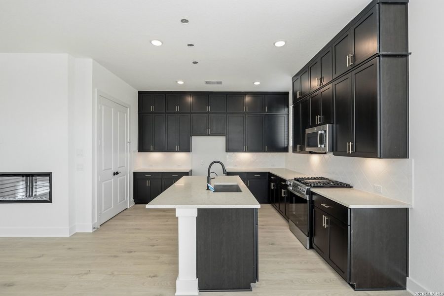 Furnished interior view inside a new home in Prominence Urban, San Antonio (Image 11).