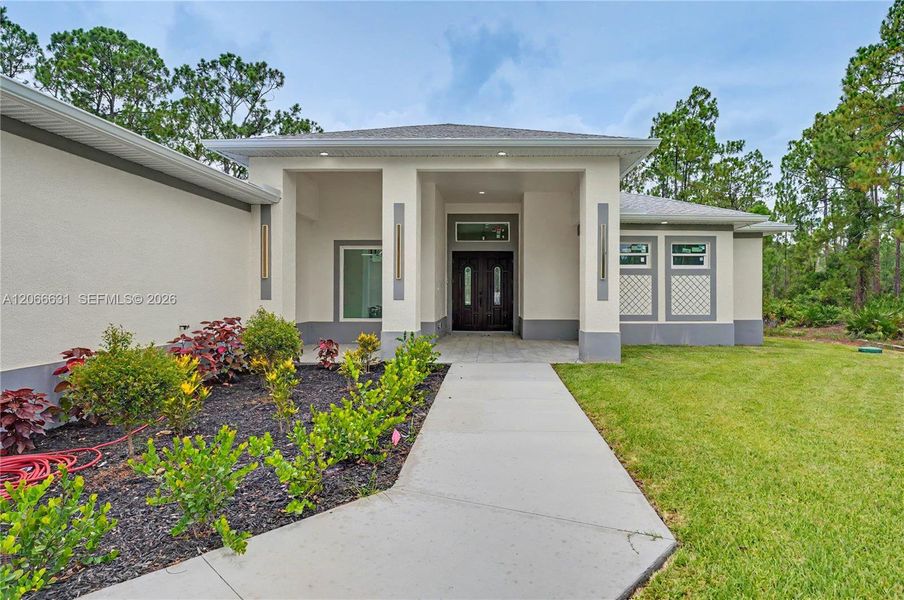 Exterior details and patio area of a home in , Lehigh Acres (Image 25).