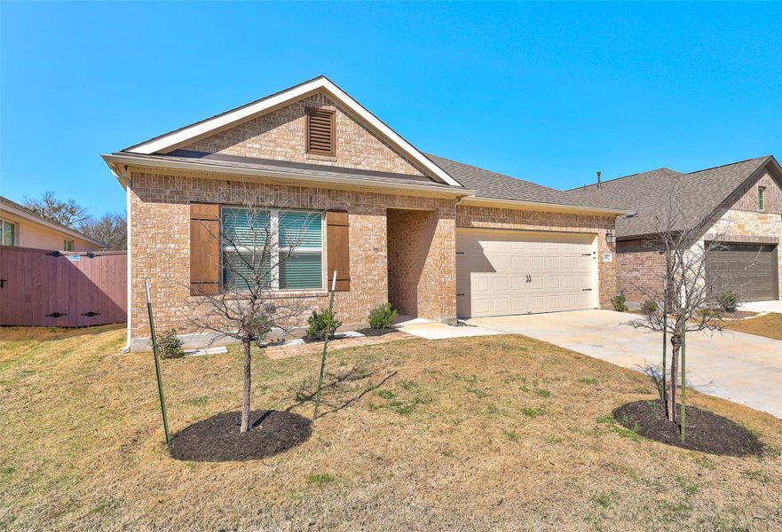 Front exterior of a new home in , Kyle, TX, highlighting curb appeal (Image 25).