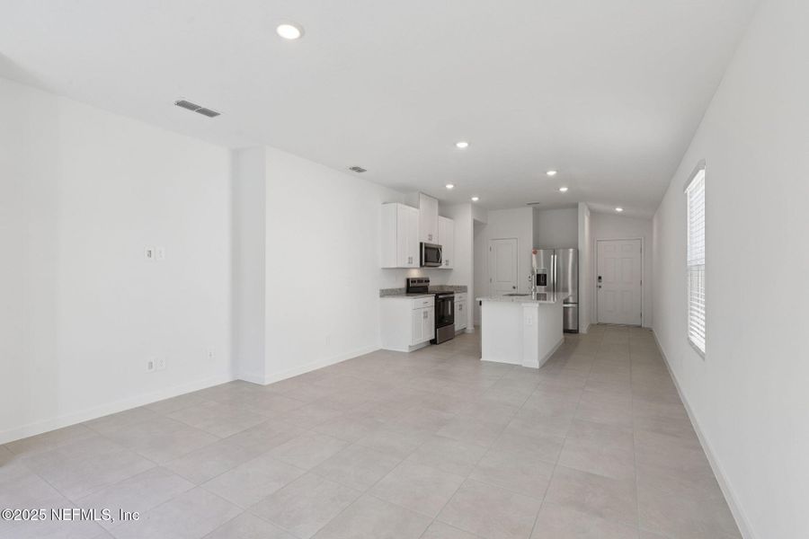 Spacious, unfurnished interior of a new home in Flagler Village - Classic Series, Palm Coast (Image 18).