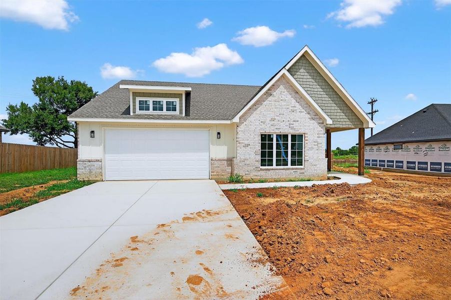 Front exterior of a new home in , Callisburg, TX, highlighting curb appeal (Image 2).