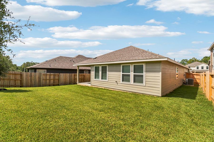 Front exterior of a new home in Pine Lake Cove - Premier Series, Montgomery, TX, highlighting curb appeal (Image 1).