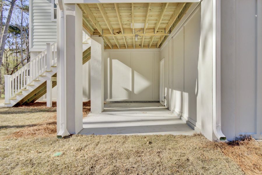 Exterior details and patio area of a home in , Johns Island (Image 27).