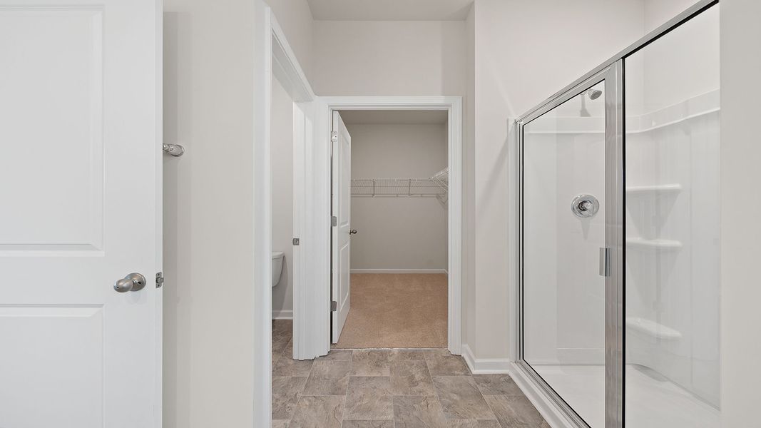 Spacious, unfurnished interior of a new home in Durbin Meadows Traditions, Fountain Inn (Image 30).